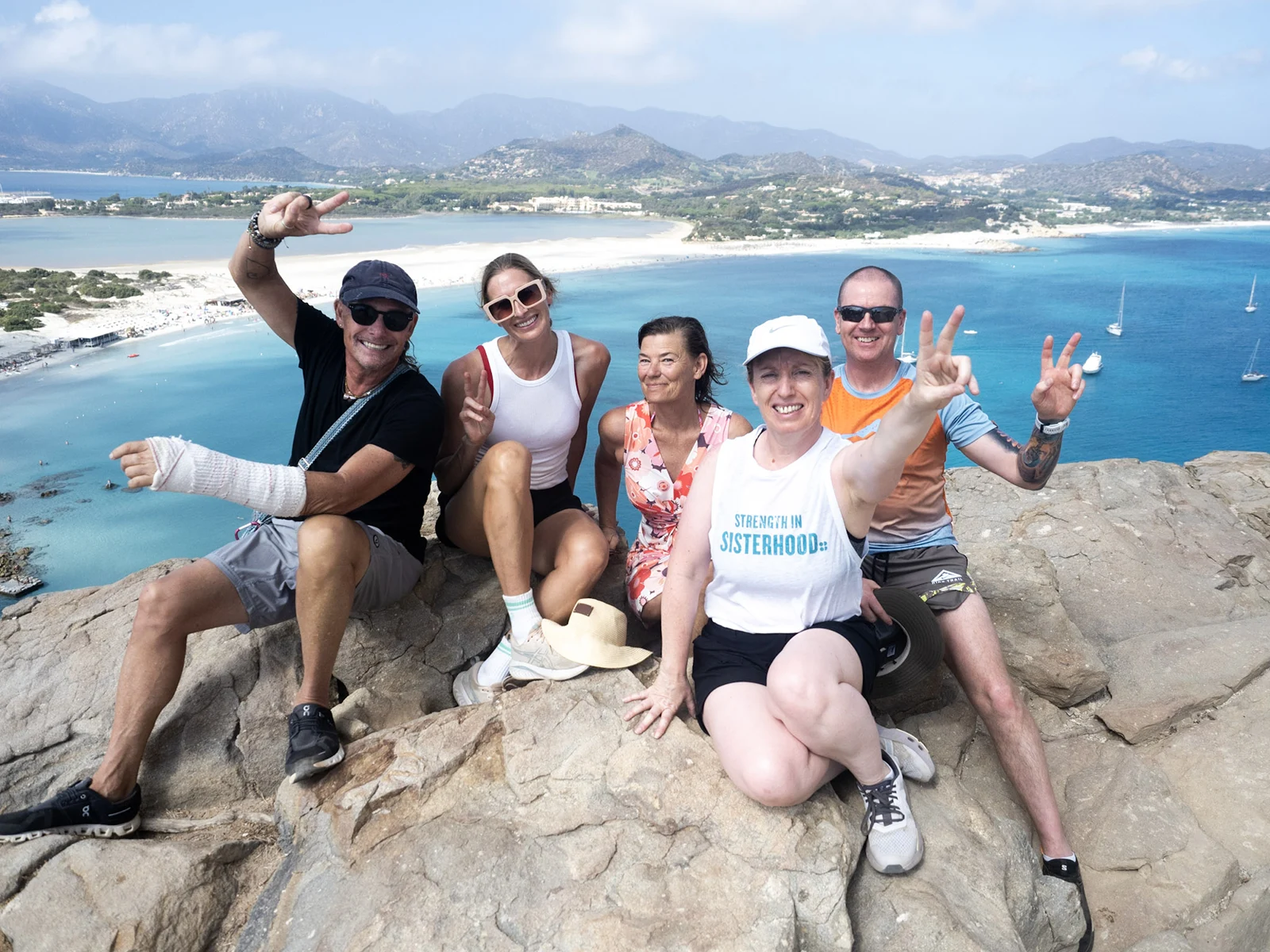Glimpse of yoga retreat, enjoying beauty at hill top with sea sail boats and and mountains at the background