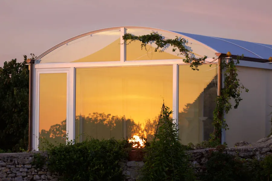 Glass room sunset